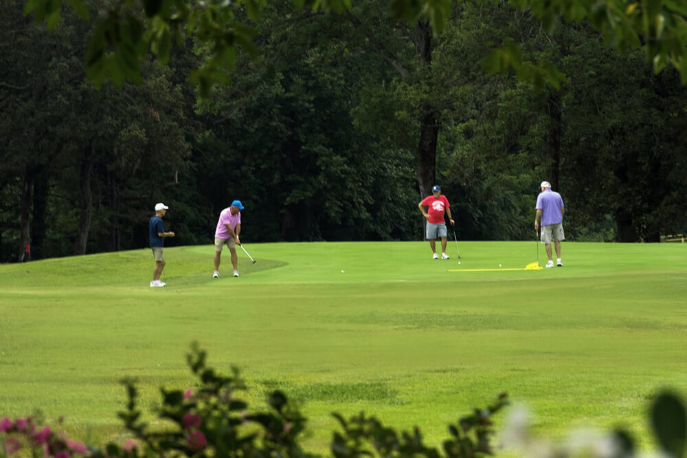 twin lakes golfer putting on number 7 green